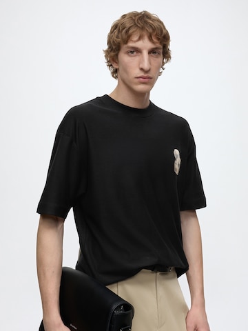 Tricou 'Detzi' de la HUGO pe negru
