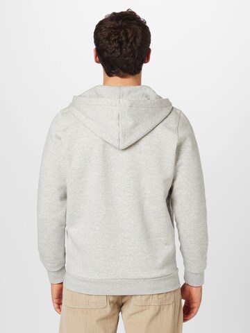 Veste de survêtement UNDER ARMOUR en gris