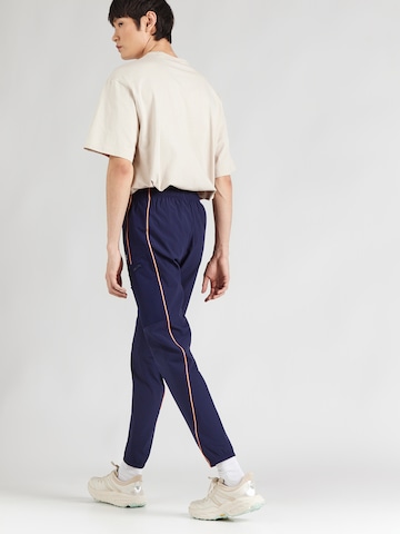 UNDER ARMOUR Normalny krój Spodnie sportowe 'Challenger' w kolorze niebieski