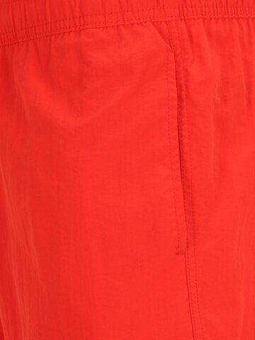 Tommy Jeans Plavecké šortky – červená