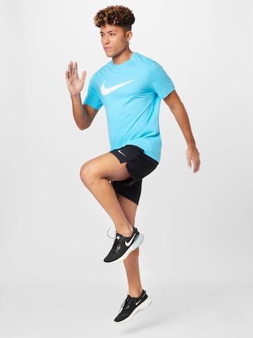Nike Sportswear - Camiseta 'Swoosh' en azul