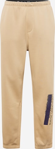 Calvin Klein Jeans Tapered Pants in Beige: front