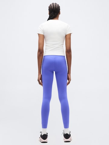 Skinny Pantalon de sport NIKE en bleu