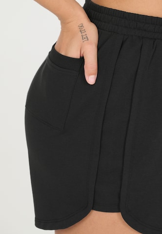 NOU Loose fit Trousers 'Vacay' in Black