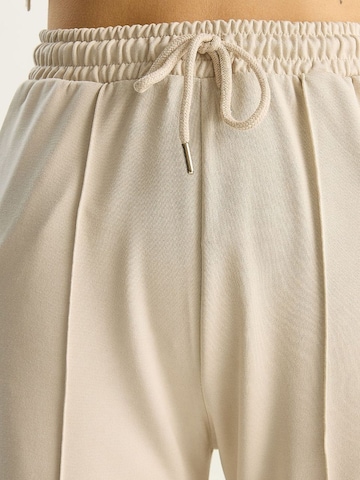 Bianco Lucci - Roupa de casa em bege