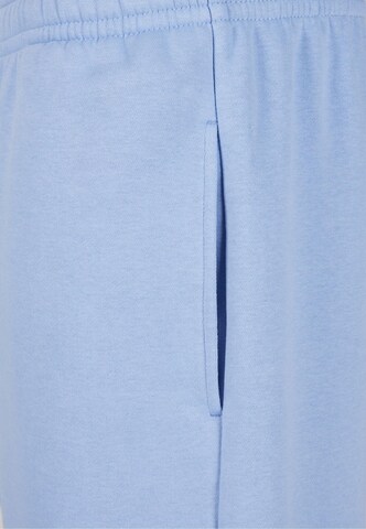 Tapered Pantaloni 'Fluffy' di Urban Classics in blu