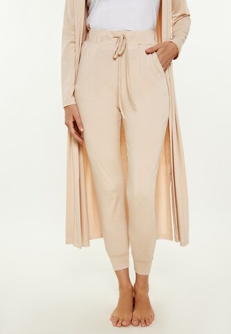 Usha - Tapered Pantalón 'Fashion Look' en beige: frente