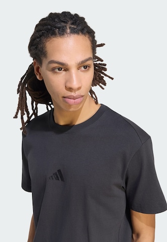 ADIDAS SPORTSWEAR - Camiseta funcional en negro