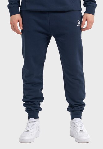 Oldskull Tapered Trousers 'Basic Oldskull 25 Logo' in Blue: front