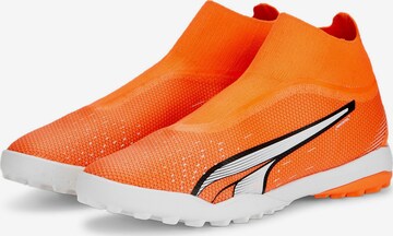 Chaussure de foot PUMA en orange