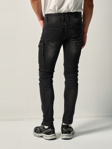 KOROSHI - Skinny Pantalón vaquero cargo en negro