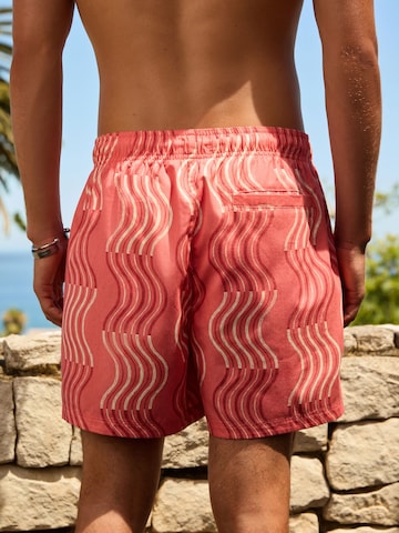Pantaloncini da bagno di Next in rosa