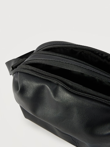 PUMA Axelremsväska 'ESSENTIALS' i svart