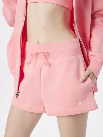 Nike SportswearLoosefit Hlače 'Phoenix Fleece' - narančasta boja