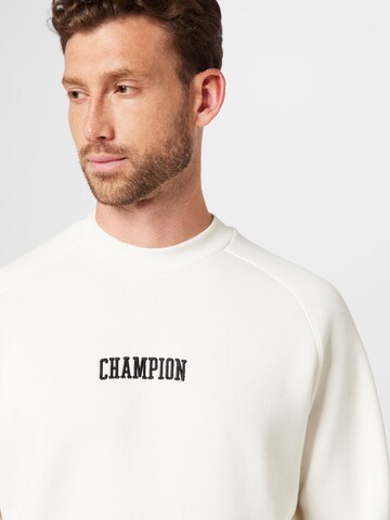 Felpa di Champion Authentic Athletic Apparel in giallo