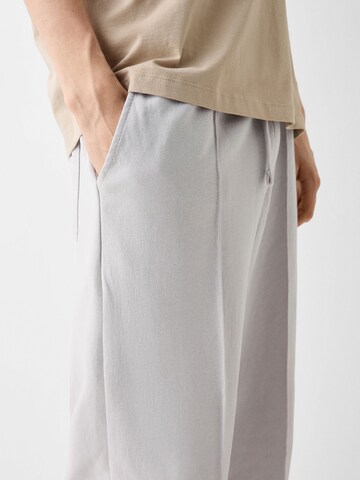 Loosefit Pantalon à pince Bershka en gris