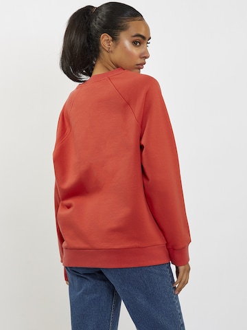 FRESHLIONS Oversized Sweater in Red