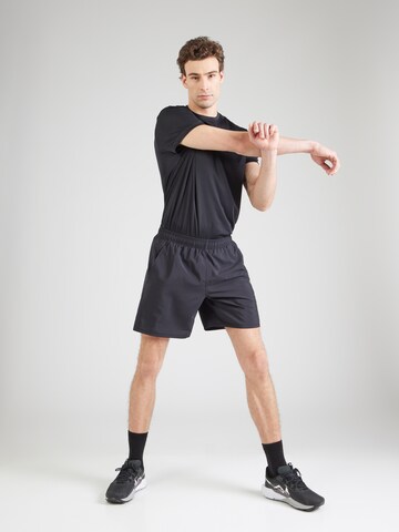Reebok - regular Pantalón deportivo 'ID TRAIN UTILITY' en negro