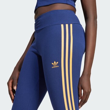 ADIDAS ORIGINALS Flared Leggings i blå