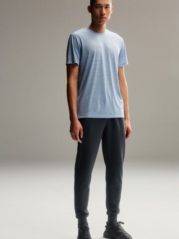T-Shirt fonctionnel Next en bleu