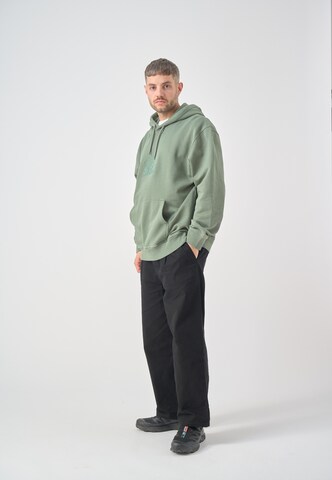 Cleptomanicx Kapuzensweatshirt 'Boxy Hooded Residence' in Grün