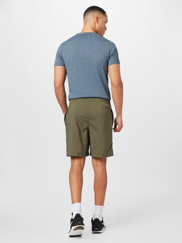 PUMA Regularen Športne hlače | zelena barva