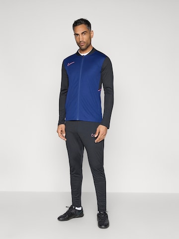 mėlyna NIKE Treniruočių kostiumas 'Academy 25': priekis