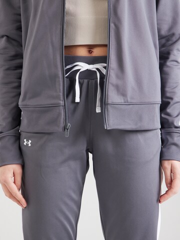 UNDER ARMOUR Skinny Tréningruha - szürke