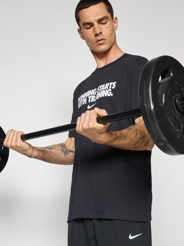 NIKE - Camiseta funcional 'WINNING' en negro