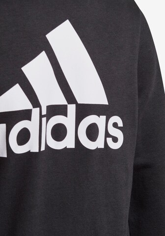 ADIDAS SPORTSWEAR Αθλητική ζακέτα φούτερ 'Essentials ' σε μαύρο