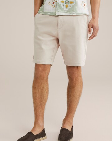 WE Fashion - Slimfit Pantalón chino en beige: frente