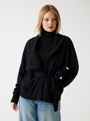 GUESS Knit Cardigan in Black: front