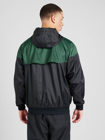 Nike Sportswear - Chaqueta de entretiempo 'Heritage Essentials' en negro