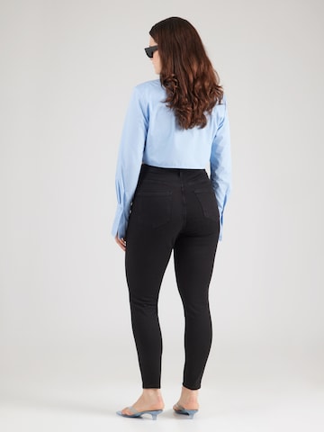 Vero Moda Curve Skinny Jeans 'VMCPOLLY' in Black