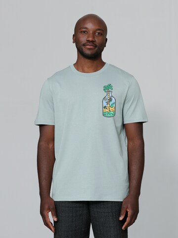 Watapparel Shirt ' Holiday in a bottle ' in Groen: voorkant