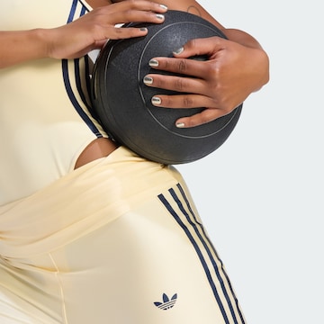 Bootcut Pantaloni sportivi 'Superstar' di ADIDAS PERFORMANCE in giallo