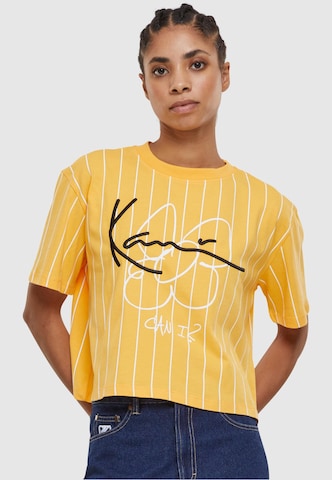 T-shirt Karl Kani en orange : devant