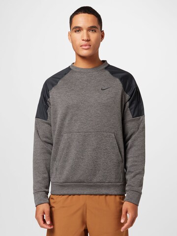 NIKE Sportsweatshirt in Grijs: voorkant