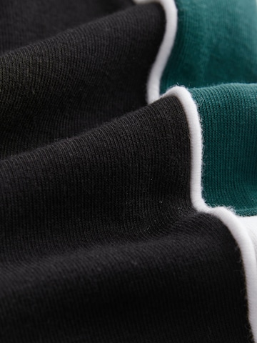 Regular Pantaloni de la Next pe negru