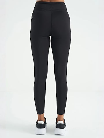 Skinny Leggings 'Gamaschen' di Tommy Life in nero