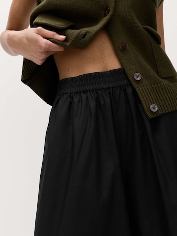 Marks & Spencer Flared Hose in Schwarz