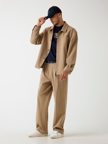 GUESS Between-Season Jacket in Brown