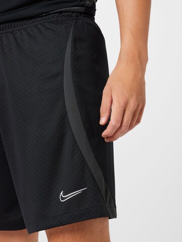 NIKE Regular Workout Pants in Black