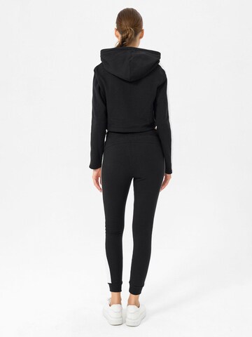 Skinny Pantalon de sport 'Naka' MOROTAI en noir