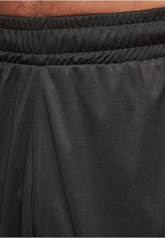 Loosefit Pantaloni di Ecko Unlimited in nero