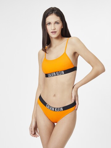 Calvin Klein Swimwear Spodní díl plavek – oranžová