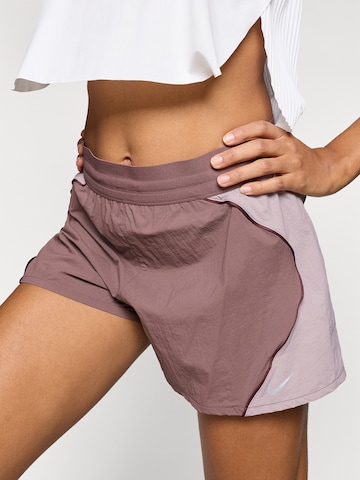 NIKE Regular Workout Pants 'Swift' in Pink