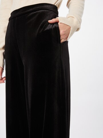 Wide leg Pantaloni 'Celvet' di Someday in nero