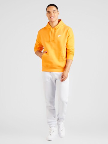Nike Sportswear Regularny krój Bluzka sportowa 'Club Fleece' w kolorze pomarańczowy