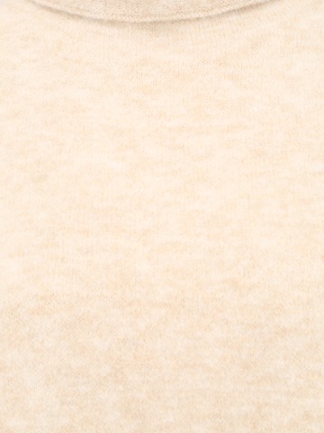 Mantellina di Sisley in beige